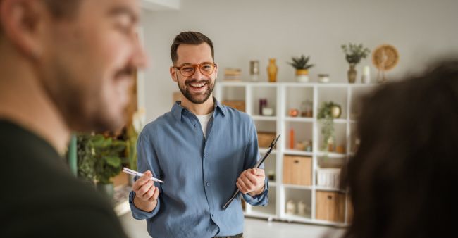 A couple talking to their real estate agent