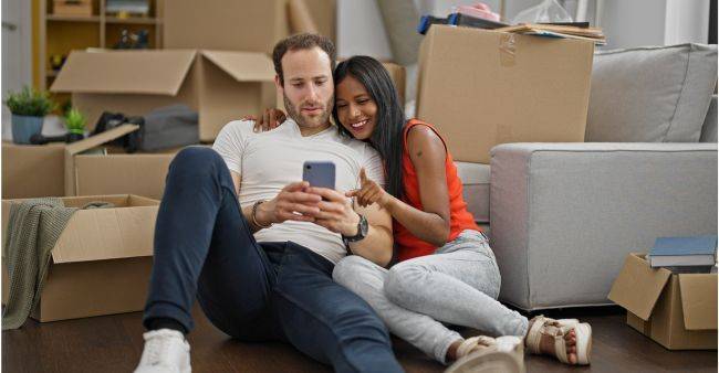 Couple moving into their new home