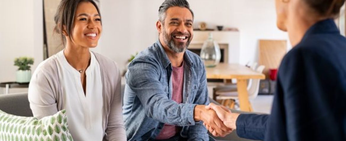 A Couple Choosing A Real Estate Agent